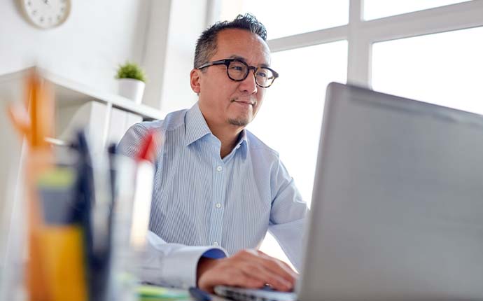 Business person using a laptop computer