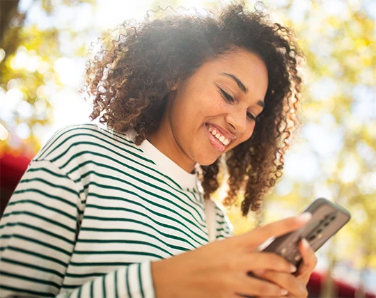A smiling PayPal customer