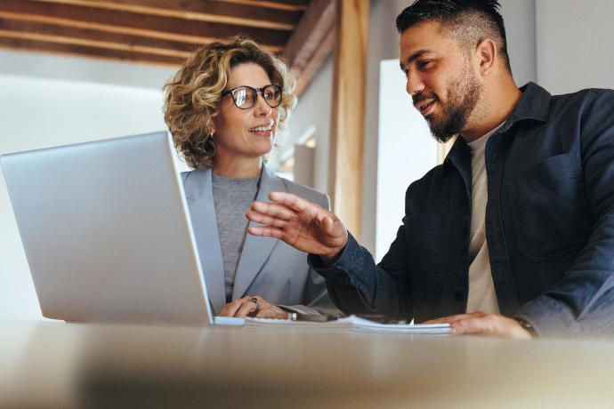 Two people attending a webinar